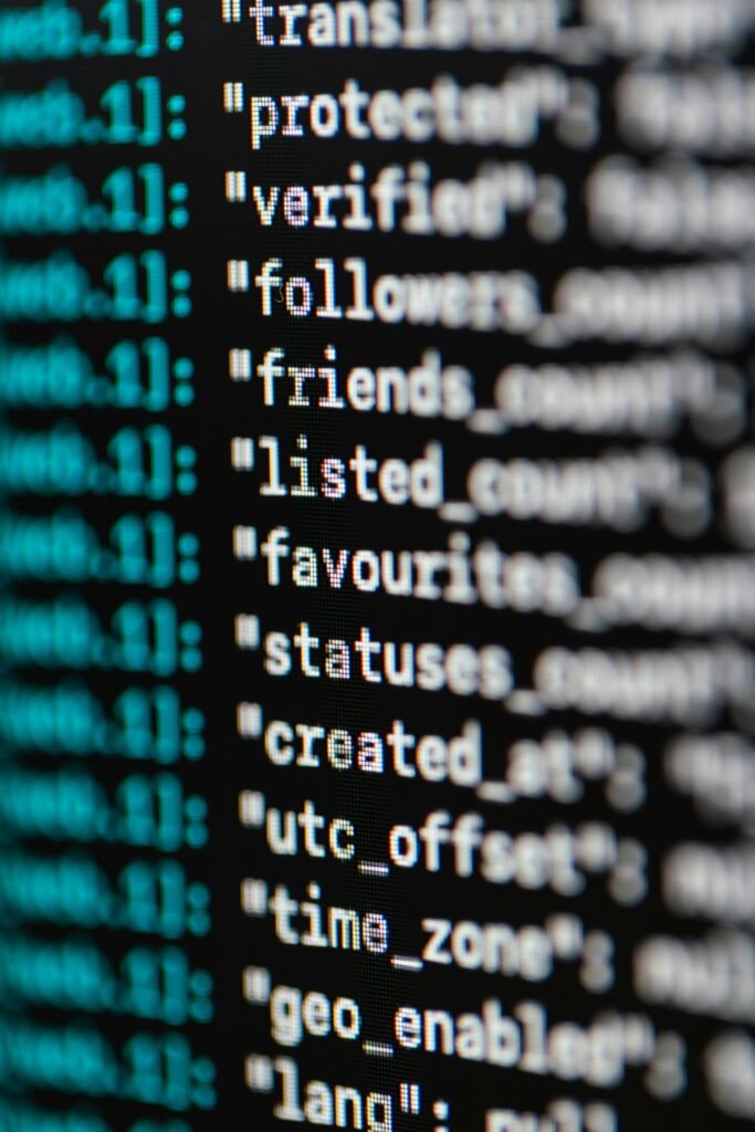 pexels-photo-3861976-3861976 Extreme close-up of computer code displaying various programming terms and elements.